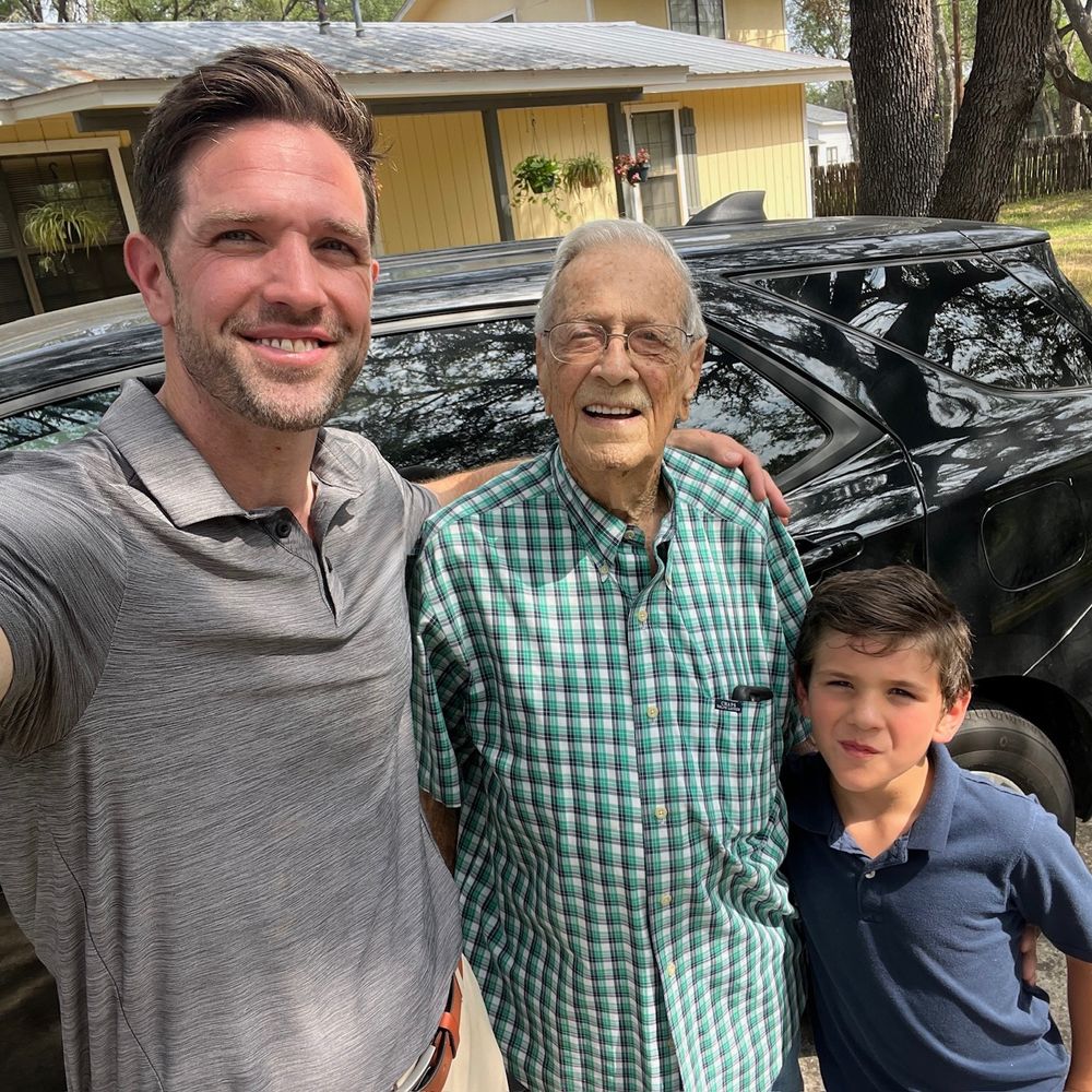Daniel with three generations of a homeowner's family